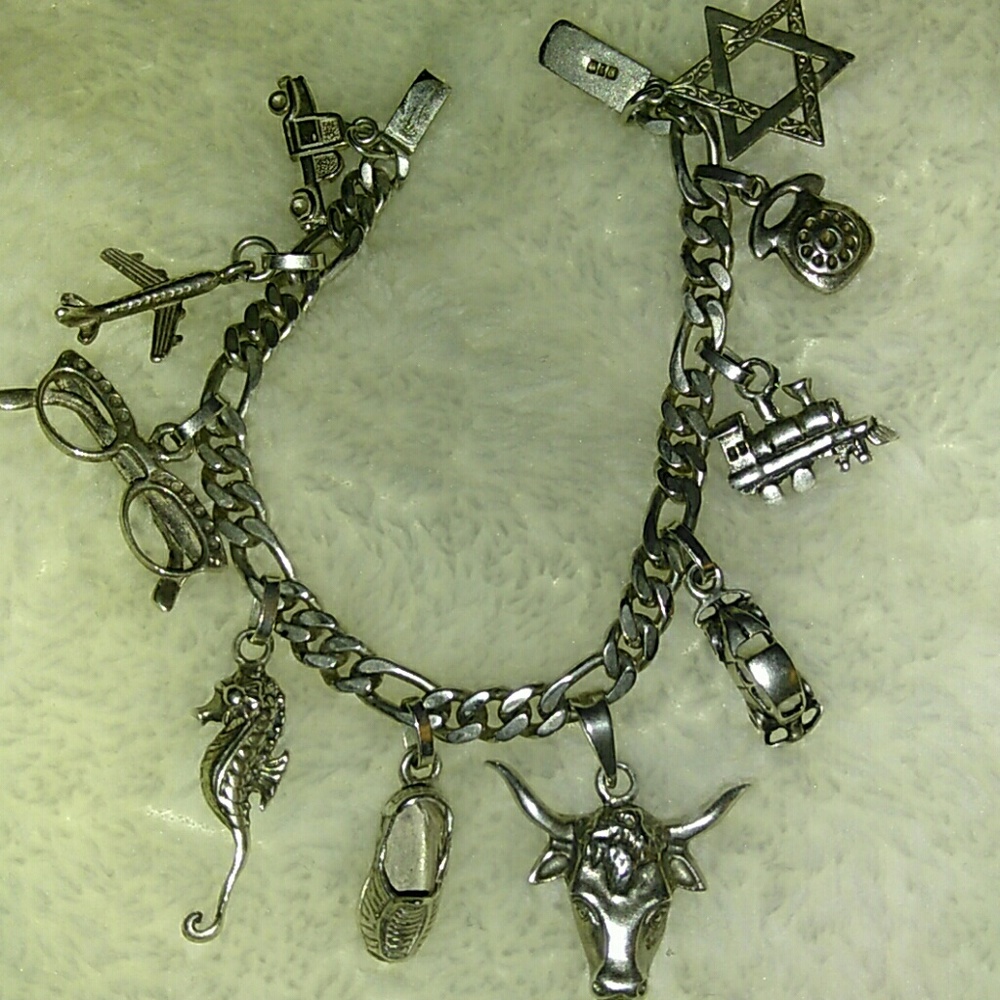 STERLING SILVER SOLID MULTI CHARM BRACELET